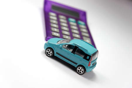 A car and a calculatorの写真素材
