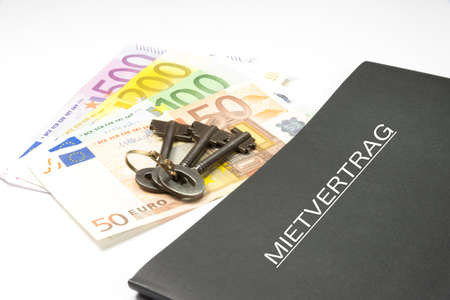 A German rental agreement, keys and many euro billsの写真素材