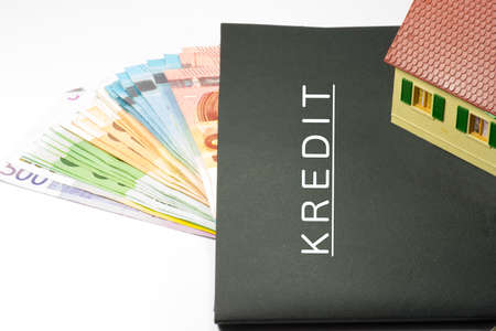 Euro money, house and a folder with credit documentsの写真素材