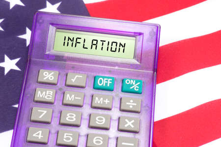 American flag, calculator and inflationの写真素材