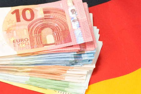 German flag and euro banknotesの写真素材