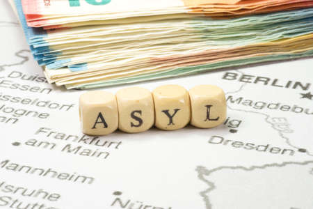 Euro money, German map and asylumの写真素材