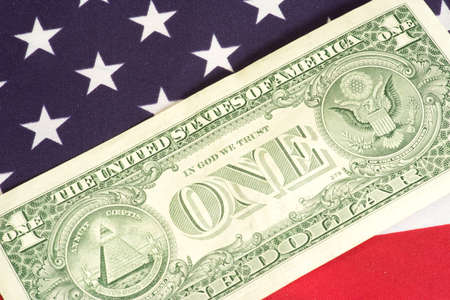US dollar and US flagの写真素材