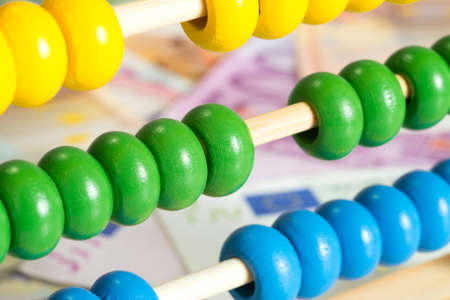 Euro money and an abacusの写真素材