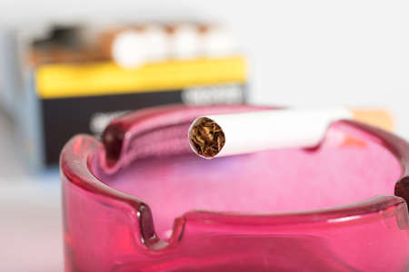 A cigarette in the ashtrayの写真素材