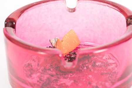 A cigarette in an ashtrayの写真素材