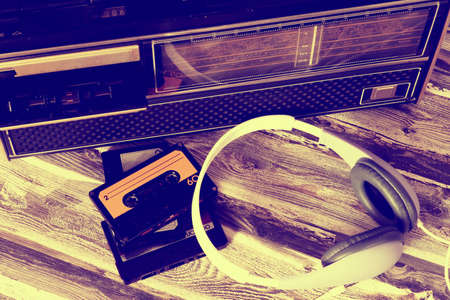 An old tape recorder, music cassettes and headphonesの写真素材