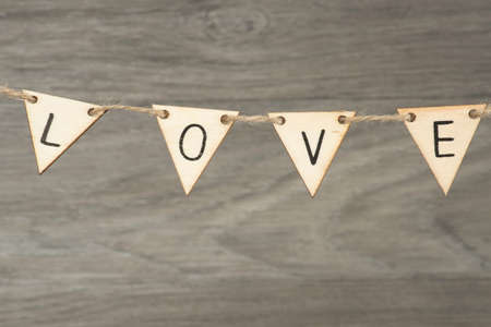 The word love made of wooden lettersの写真素材