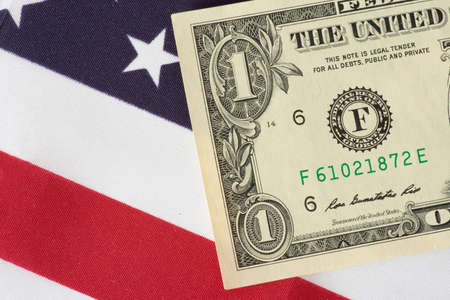 Flag of USA and dollar billsの写真素材