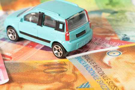 A car and Swiss francsの写真素材