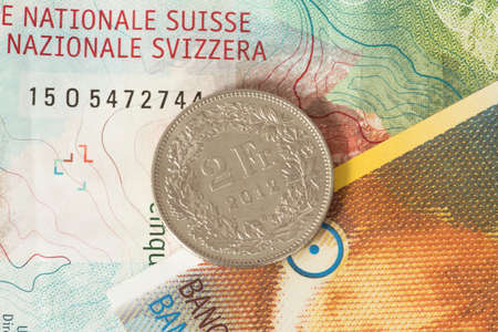 Swiss franc coins and banknotesの写真素材