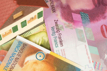 A house and Swiss francsの写真素材