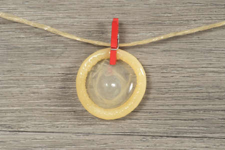 A condom on a clothes lineの写真素材