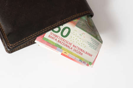 A wallet and Swiss francsの写真素材
