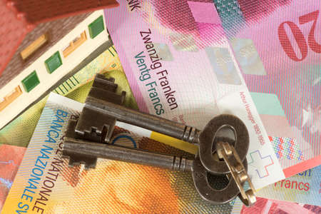 A house, Swiss francs and a keyの写真素材
