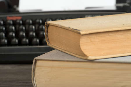 A typewriter and booksの写真素材