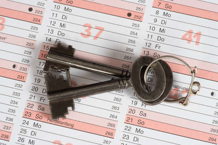 A calendar and a keyの写真素材