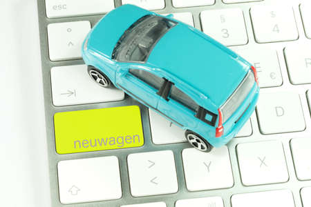 Keyboard and a button for new car purchase