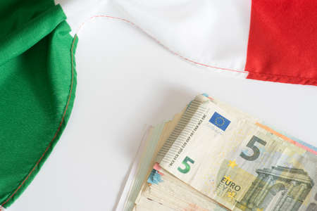 Italian flag and euro billsの写真素材