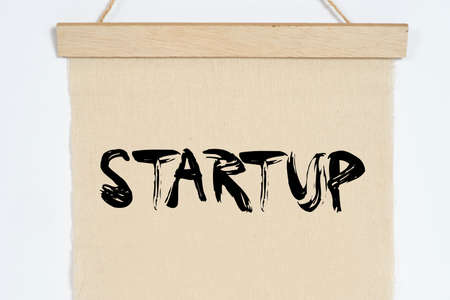 A textile board with the word startupの写真素材