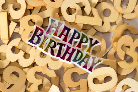 Wooden letters and a Happy Birthday sticker