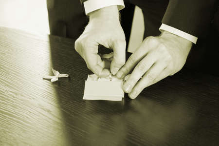 A man, wedding rings and a weddingの写真素材