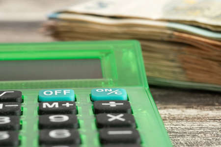A calculator and euro billsの写真素材