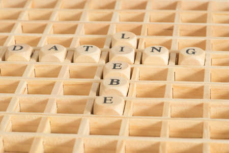 Words dating and love made of wooden letters