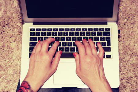 A woman at the laptopの写真素材