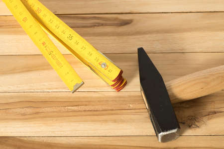 A hammer and a folding ruleの写真素材