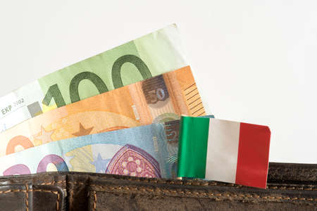 Euro bills, flag of Italy and a walletの写真素材