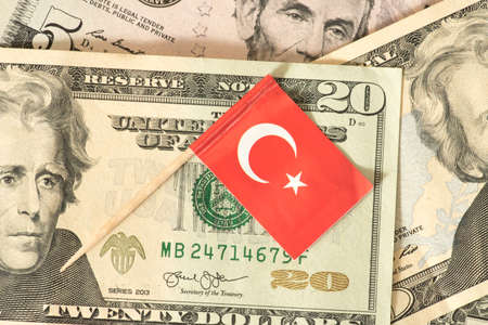 Flag of Turkey and dollar bills in the backgroundの写真素材