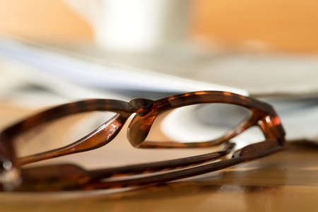 A reading glasses and a newspaperの写真素材