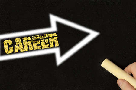 Chalk board and an arrow in direction Career