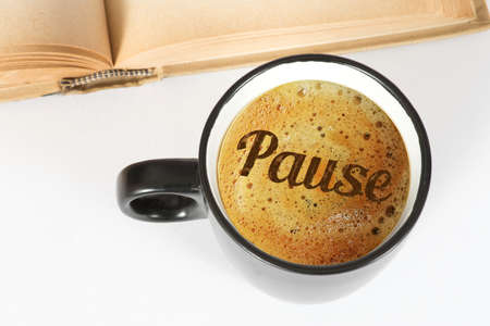 A book, coffee cup and the breakの写真素材