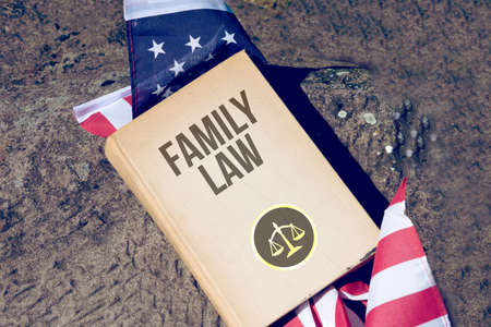 Flag of America and Book Family Law