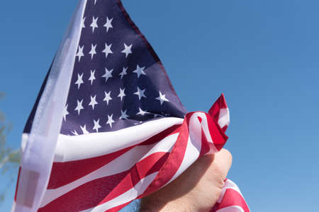 A man and the flag of America