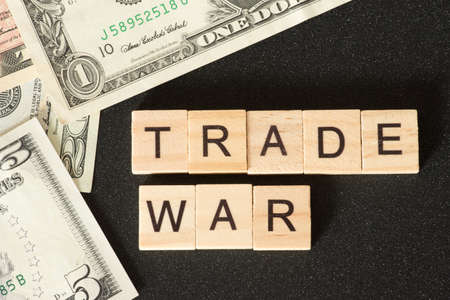 Dollar bills and trade warの写真素材