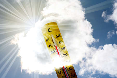 A thermometer and heat in summerの写真素材