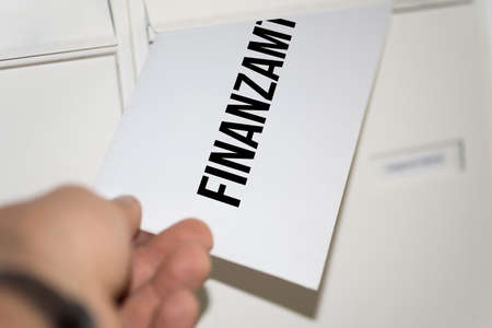 Mailbox and mail from the tax officeの写真素材