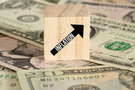 Dollar bills and rising inflation in America