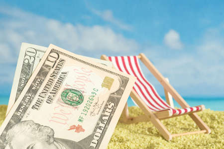 Dollar bills, vacation and beach
