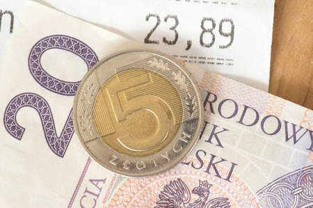 A receipt and money Polish zloty PLNの写真素材