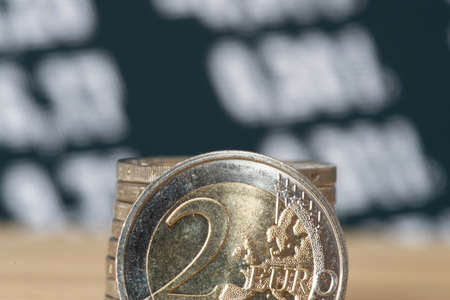 Euro coins and the stock exchangeの写真素材