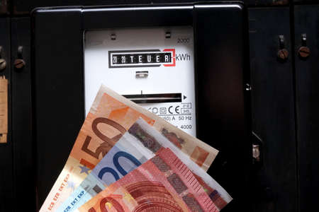 Electricity meter, euro money and price for electricity 2020の写真素材