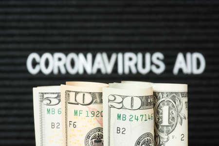 Dollar bills and aid package for America's economy