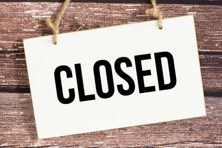 White sign Closed
