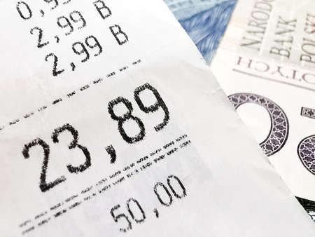 Money Polish zloty PLN and a receiptの写真素材