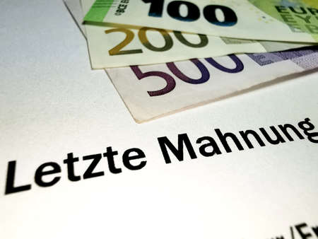 A reminder and euro banknotesの写真素材