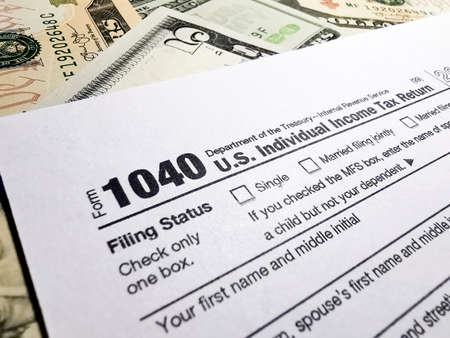 Dollar bills and tax returns in the USA